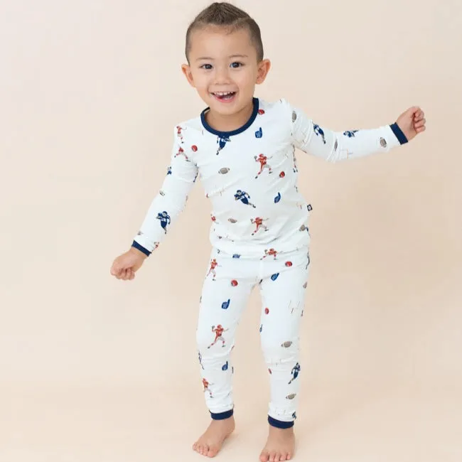 Kyte Baby Printed Long Sleeve Pajamas in Football