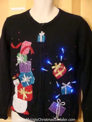 Light Up Christmas Sweater Bling Snowman Toppling Gifts