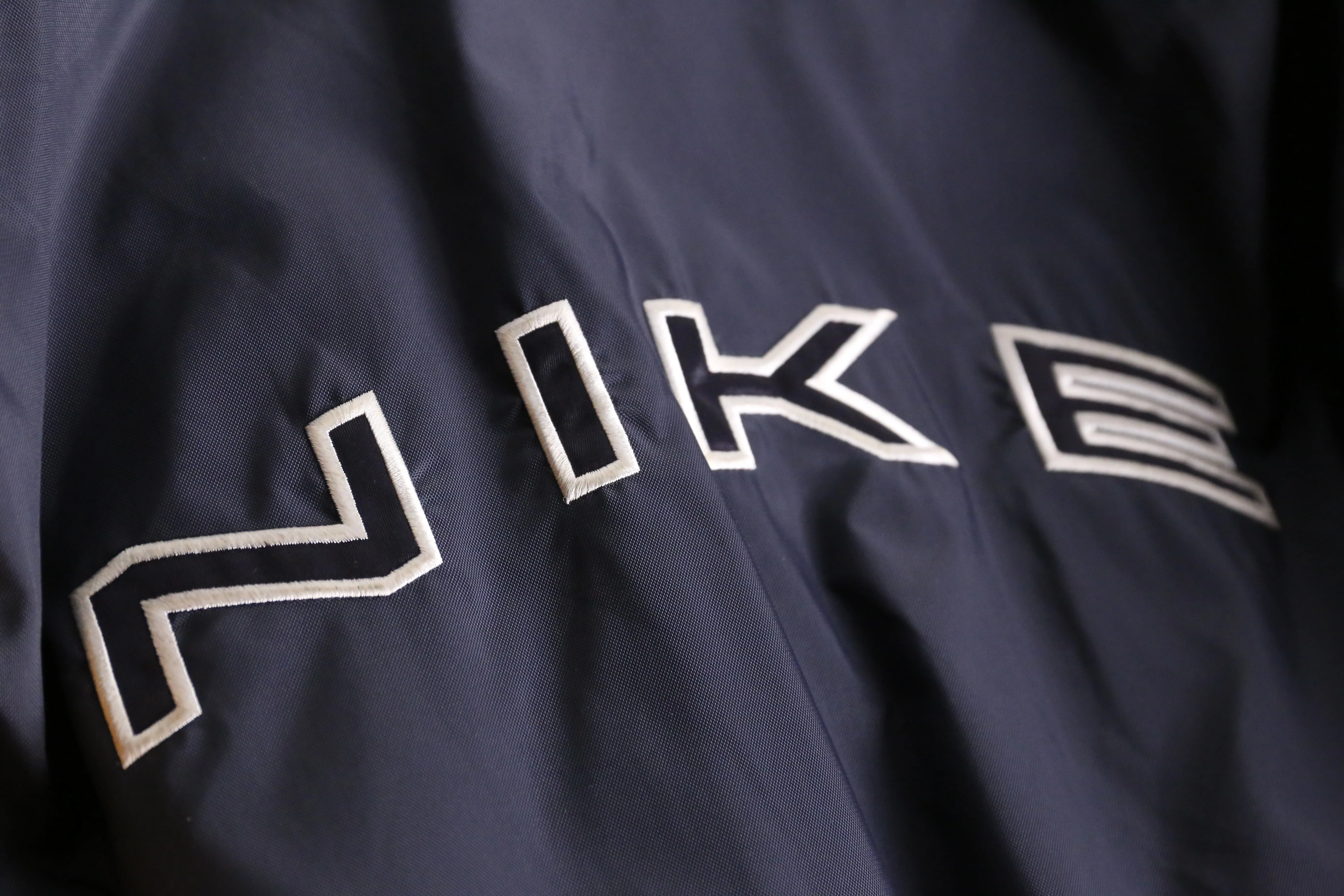 "NIKE" bi-color nylon track jacket